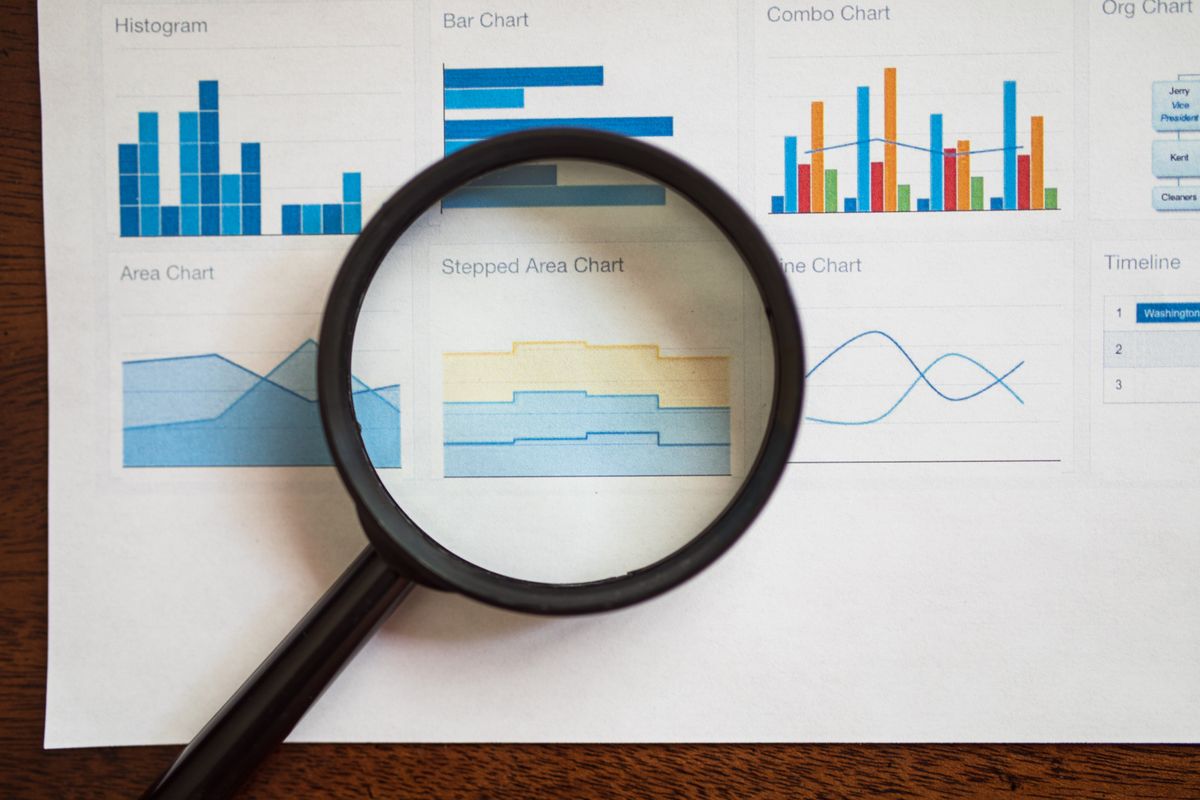 Examining charts with a magnifying glass